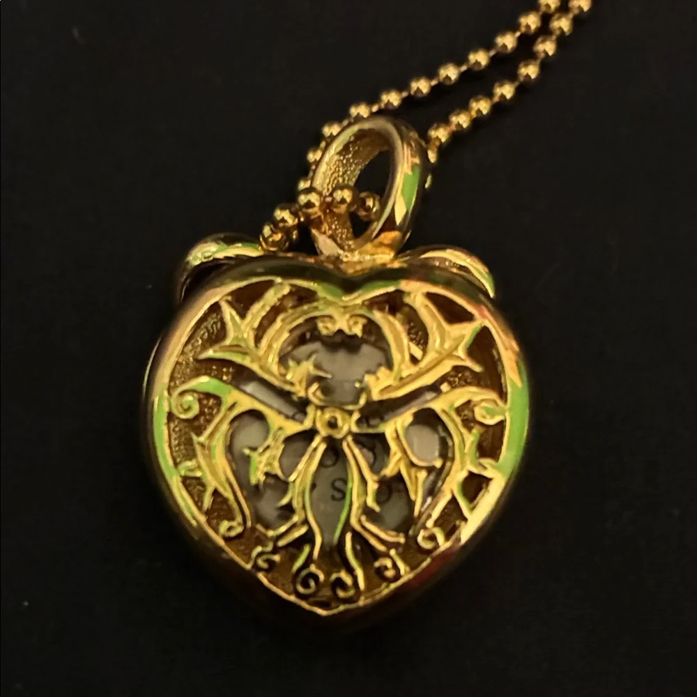 Pair of Gold Tone Pendant Necklaces with hidden (untested) watches - Picture 8 of 8